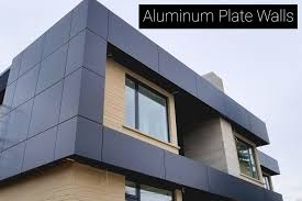 A gray aluminum wall plate on a building surface in Juba, South Sudan.