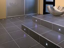 Black tiles, well installed on the floor & stairs in Juba, South Sudan