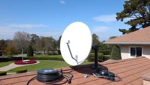 A satellite dish mounted on the top side of a house in Juba, South Sudan