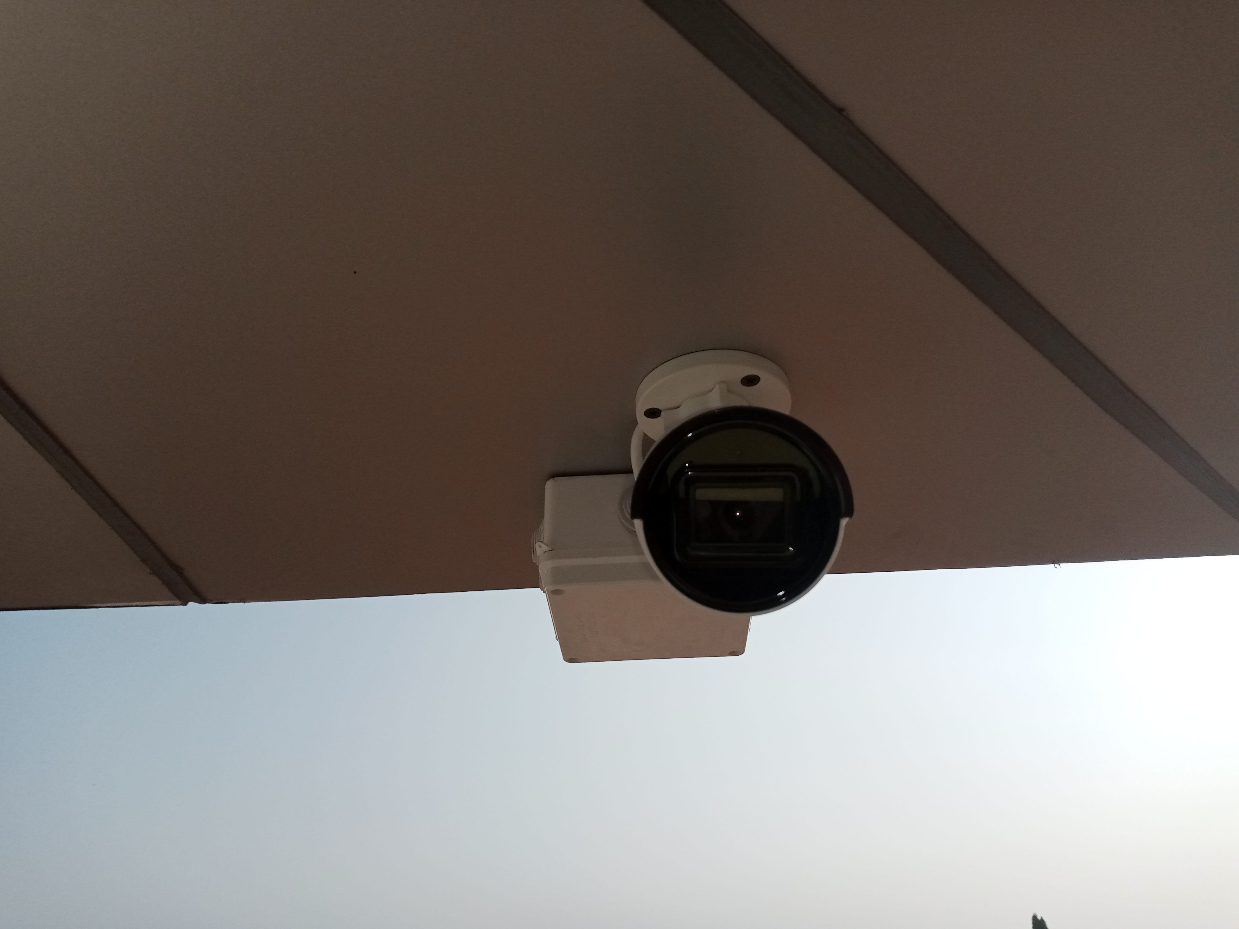 A front view of a mounted CCTV camera