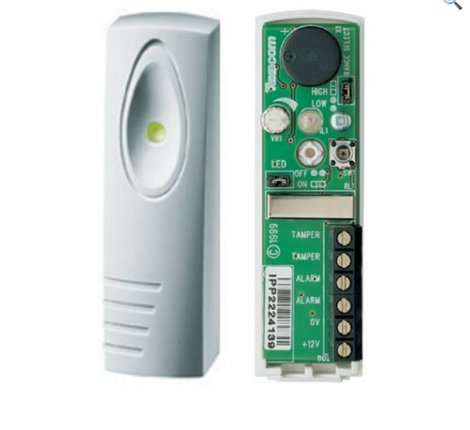 A white vibration detector in a white background