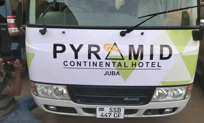  A branded front view of a minibus in Juba, South Sudan